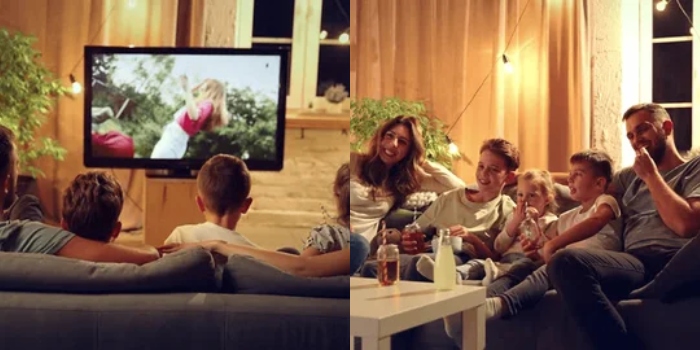 A family enjoys movie night on a new 4K TV, highlighting a great entertainment deal.

